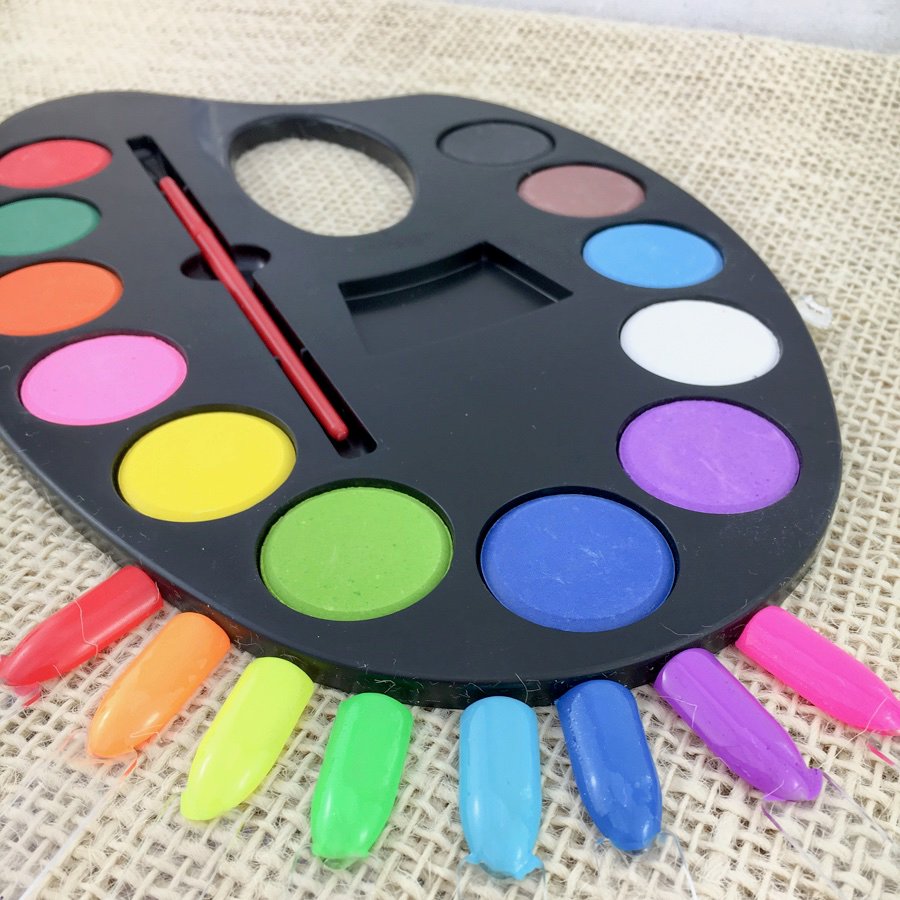 Bright coloured paint easel with matching coloured popsticks 