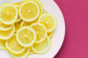 plate full of slices of lemon