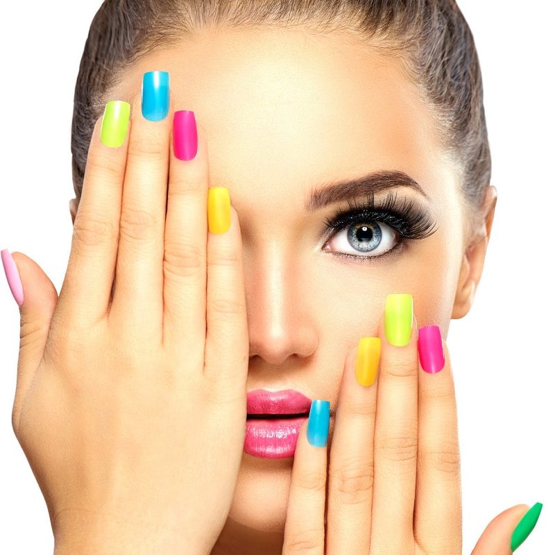 Beauty-Girl-Face-with-Colorful-Nails